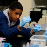 Boy performing an experiment