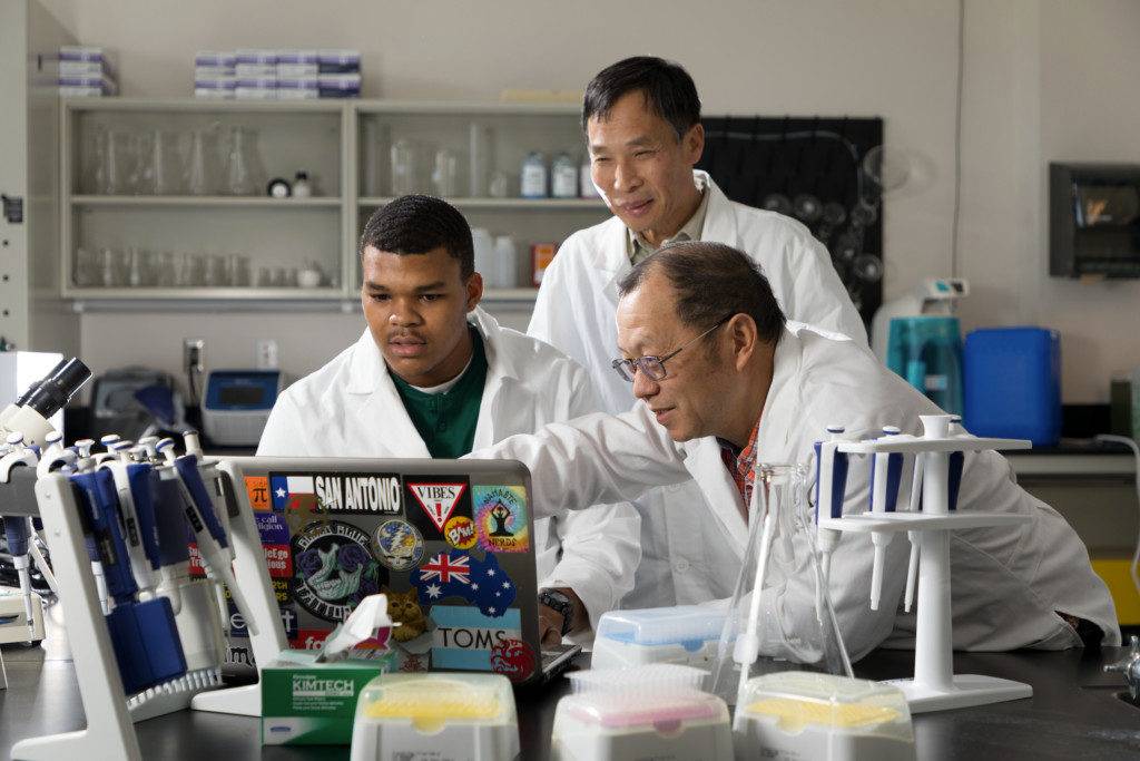FRANKFORT, Ky., -- Kentucky State University employee Changzheng Wang, PhD Associate Professor; College of Agriculture, Food Science &amp; Sustainable Systems poses with student James Brown in a genetics lab, Friday, Feb. 02, 2018 at the Kentucky State University Aquaculture Production Center in FRANKFORT.