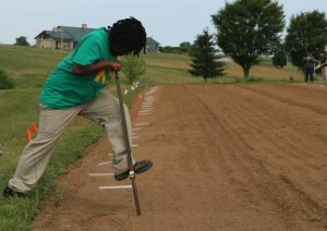 Picture of a young boy working gound