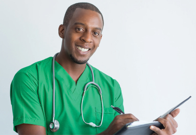 KSU nursing graduate with chart 