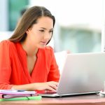 Lady in front of a laptop computer